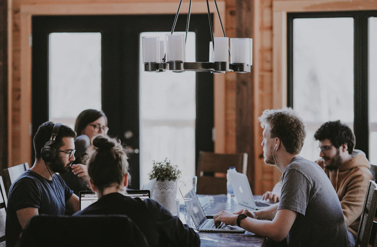 An insurance team working together in an open-plan office